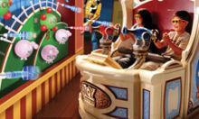 Guests on the Toy STory Mania ride at the Disney Hollywood Studios theme park.